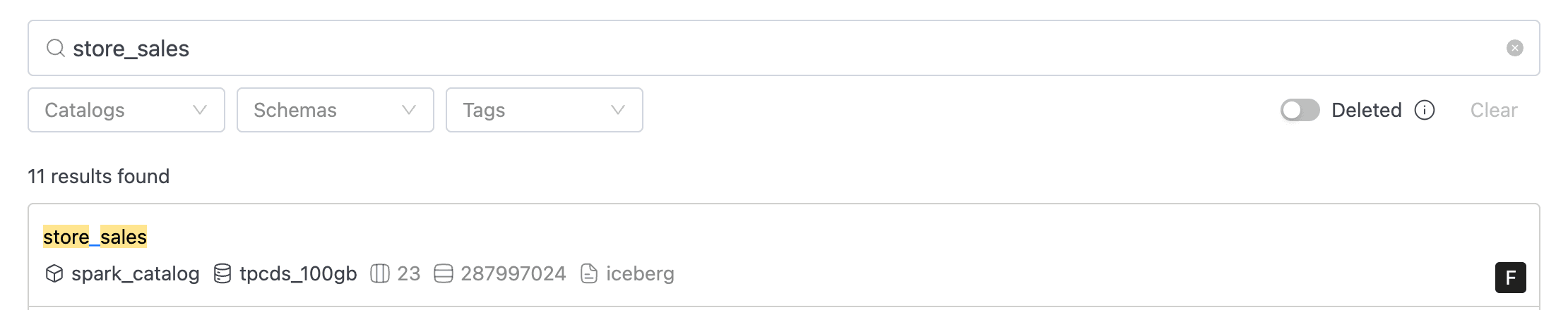 Search result card showing table name, catalog, schema, columns, rows, provider, tags, and owners | IOMETE