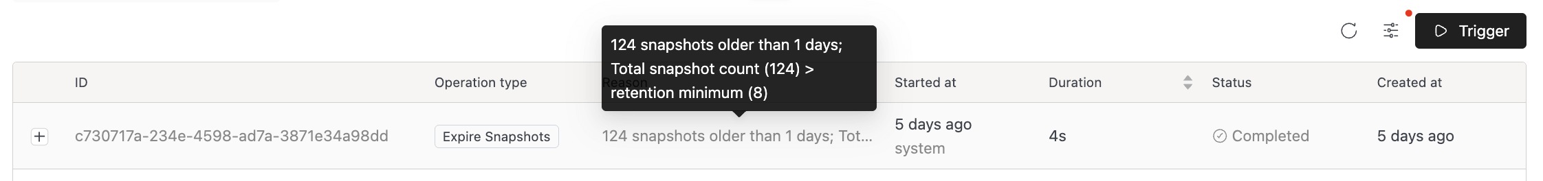Maintenance History row with the Reason column showing the threshold condition that triggered the run | IOMETE