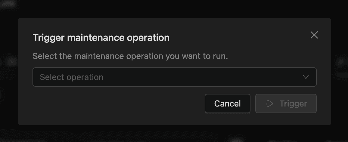 Trigger maintenance operation dialog with a Select operation dropdown and Cancel and Trigger buttons | IOMETE